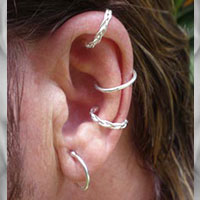 Adjustable non-piercing body rings in solid silver.
