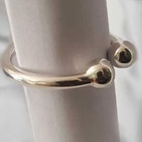 Men's custom made cock jewellery in solid silver.