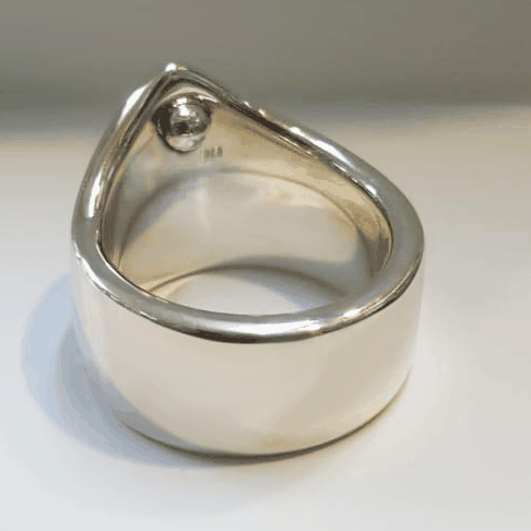 Silver frenulum cock ring showing internal 4mm pressure ball