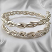 Braided adjustable cock ring with matt finish.