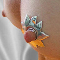 Customer wearing a handcrafted non-piercing silver nipple shield