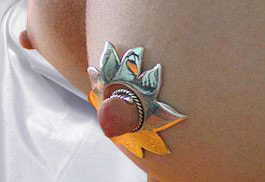 Demonstration of how a large non-piercing nipple shield is worn